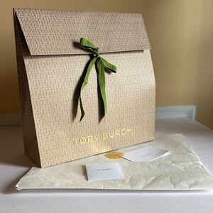 Tory Burch paper gift bag, receipt holder, white packing paper, thank you note